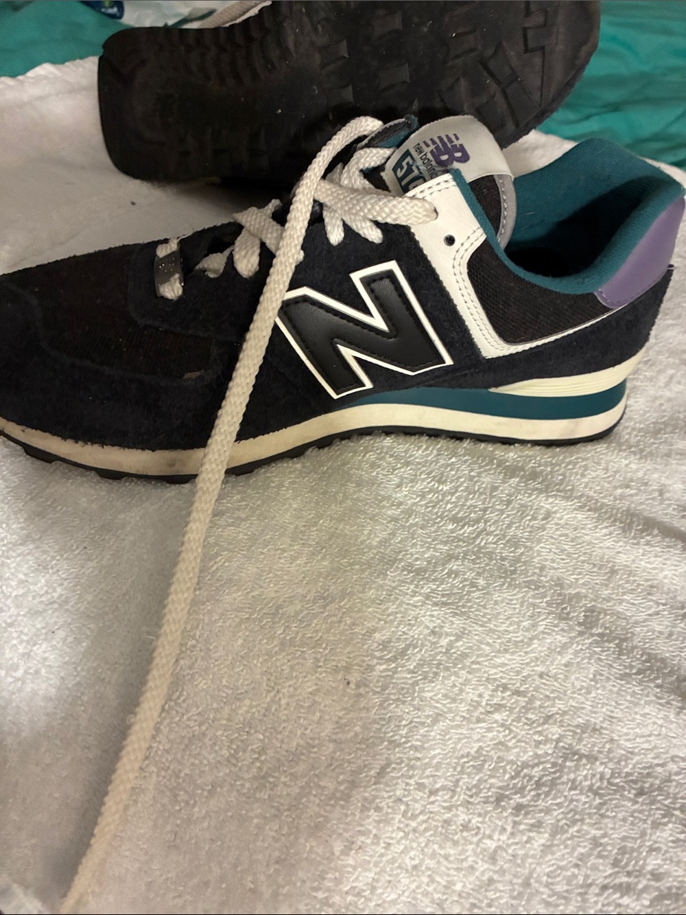 New Balance Black Sneaker with Teal and Purple Accents
